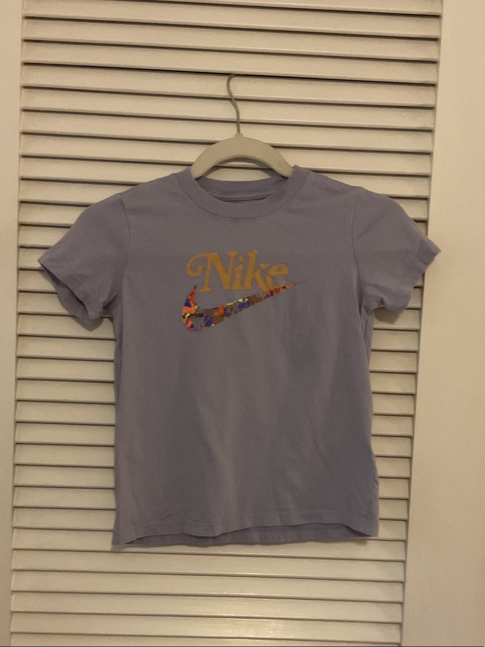 Nike Kids size small Lavender Tee with Gold Logo and Multicolor Swoosh